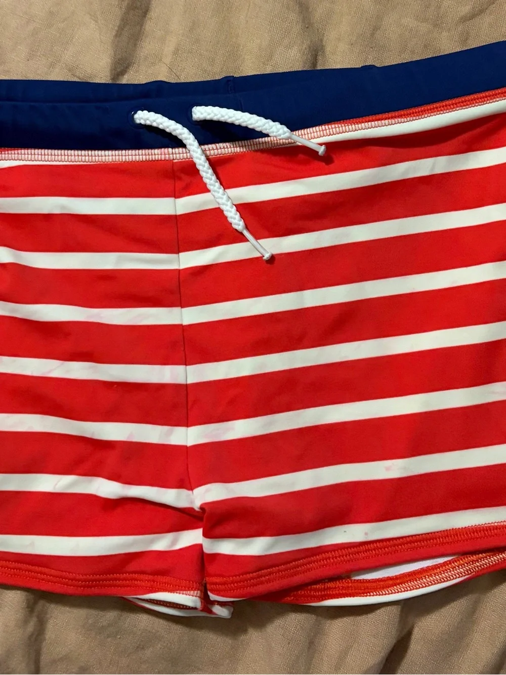 Mini Boden Red and White Striped Boys Swim Trunks with Navy Waistband